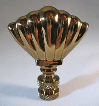 Finial:  Antiqued Brass Metal Shell.  2 1/2" overall