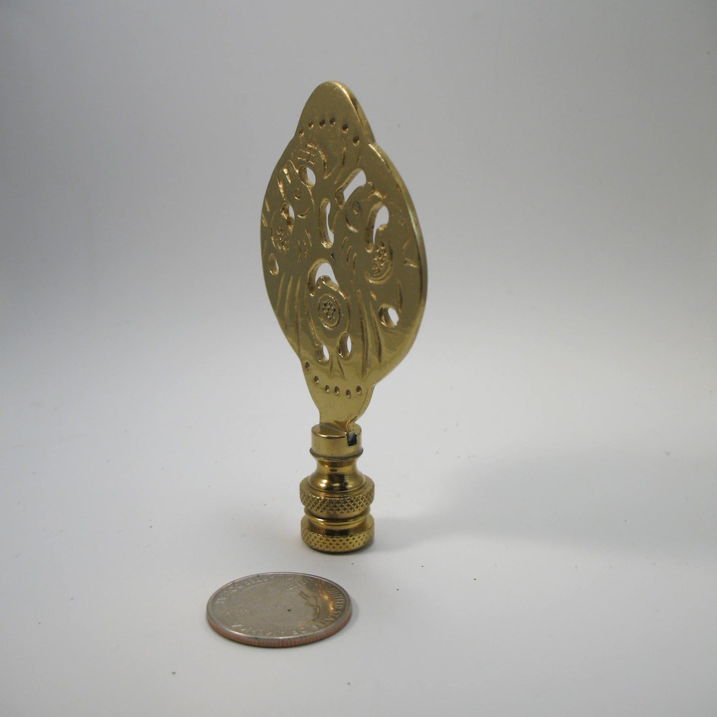 Finial:  Brass Fish Symbol. 3 1/2" overall