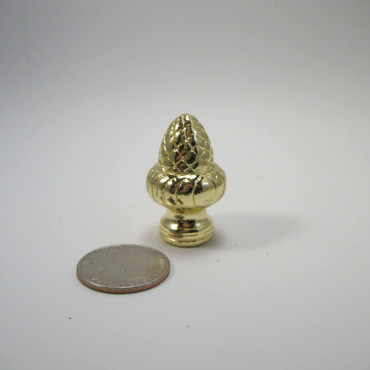 Lamp Finial: Brass Plated Acorn. 1 1/2" tall overall 3/8, 1/8ip opening