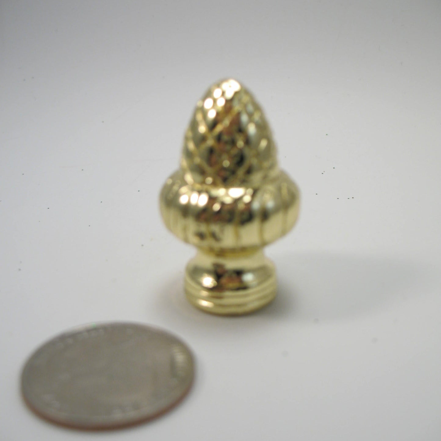 Lamp Finial: Brass Plated Acorn. 1 1/2" tall overall 3/8, 1/8ip opening